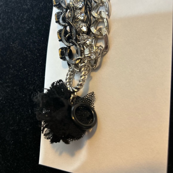 Betsey Johnson Chain/Charm bracelet
Silvertone/black/rhinestones 
Skull Key logo - Picture 10 of 11